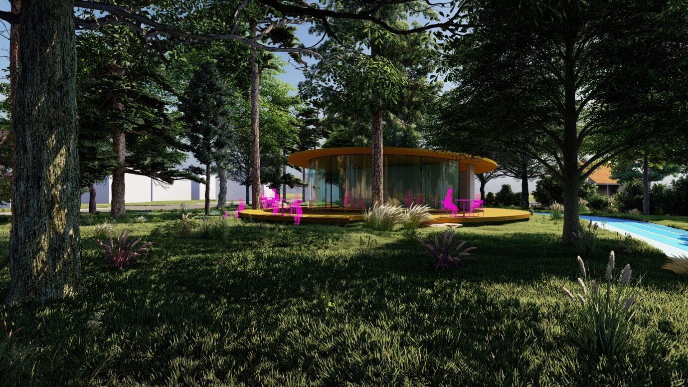 The circular auxiliary building within the landscape